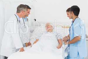 Doctor explaining report to female patient