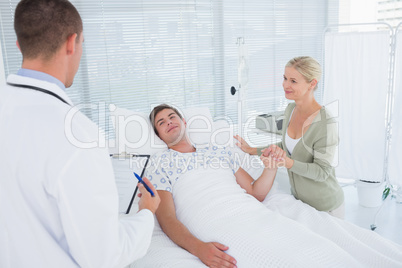 Doctor checking his patient