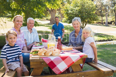 Happy family smiling at the camera