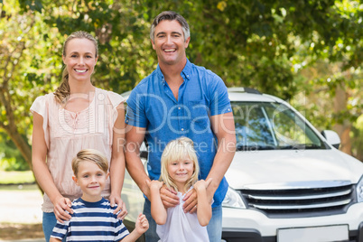 Happy family getting ready for road trip