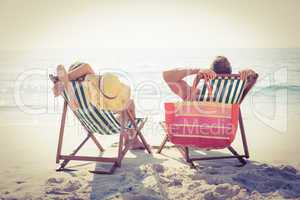 Couple relaxing on the beach