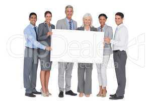 business people holding blank board