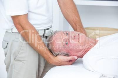 Man receiving neck massage