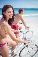 Happy couple going on a bike ride