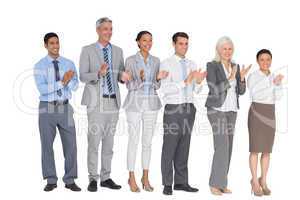 Business people holding cup and cheering