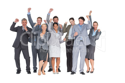 Excited business team cheering at camera