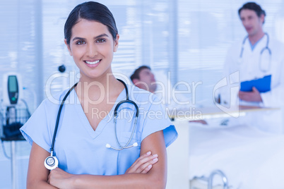 Smiling doctor looking at camera