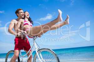 Happy couple going on a bike ride