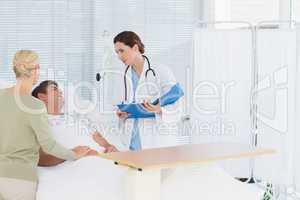 Doctor checking her patient