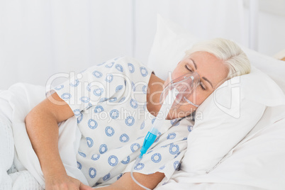 a patient with an oxygen mask