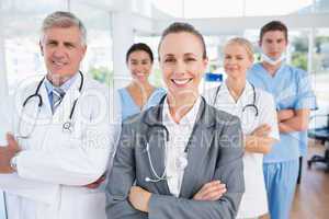 Smiling team of doctors looking at camera