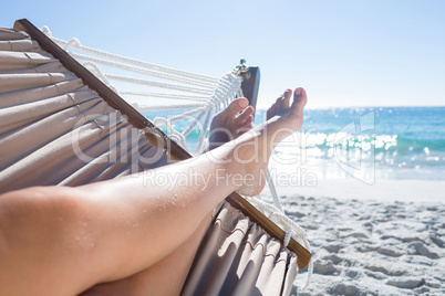 Woman relaxing in the hammock