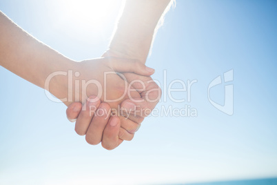 Couple walking hand in hand