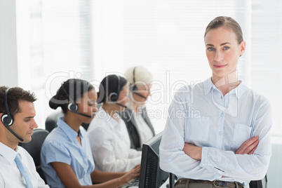 Businesswoman with executives using computers