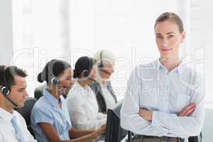 Businesswoman with executives using computers