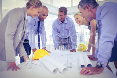 Architecture team working together at desk