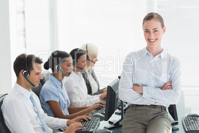 Businesswoman with executives using computers