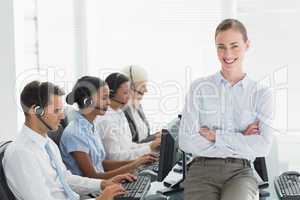 Businesswoman with executives using computers