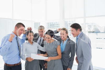 Business team celebrating a new contract