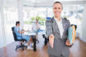 Smiling businesswoman introducing herself