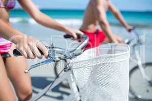 Happy couple going on a bike ride