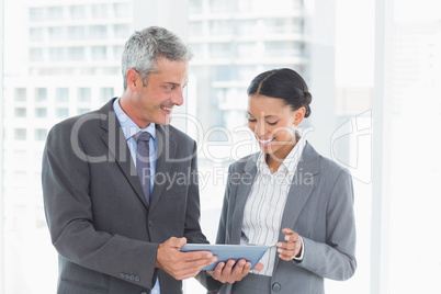 Business people using tablet computer