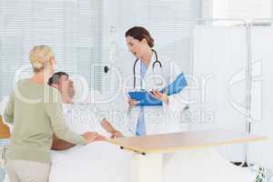 Doctor checking her patient