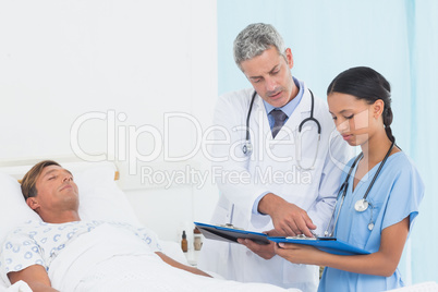 Doctor explaining report to patient