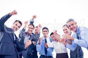 Business people cheering in office