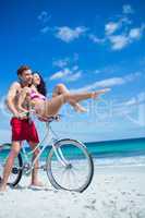 Happy couple going on a bike ride