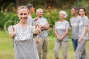 Happy volunteer with thumb up