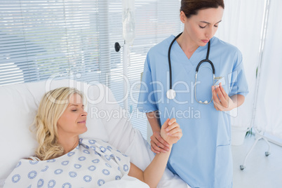 Doctor checking her patients heartbeat