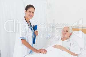 Doctor explaining report to female patient