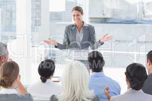 Businesswoman doing speech during meeting