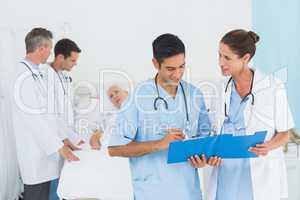 Report reading with patient behind