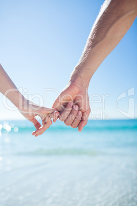 Couple walking hand in hand