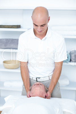 Man receiving head massage