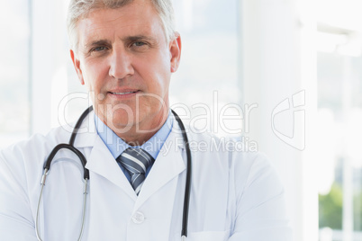 Confident male doctor looking at camera