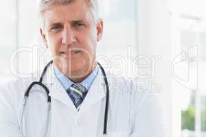 Confident male doctor looking at camera