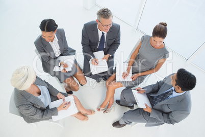 Business people in board room meeting