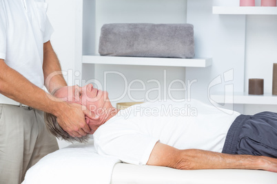 Man receiving head massage