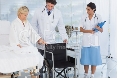 Patient trying to sit on wheelchair