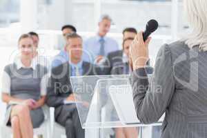 Businesswoman doing speech during meeting