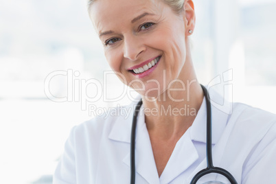 Close-up view of happy doctor looking at camera