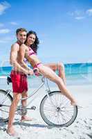 Happy couple going on a bike ride