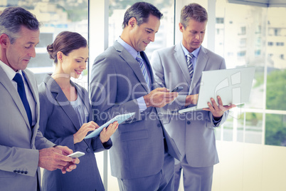 Business team using their media devices