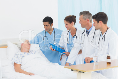 Doctor explaining report to female patient Doctor explaining report to female patient