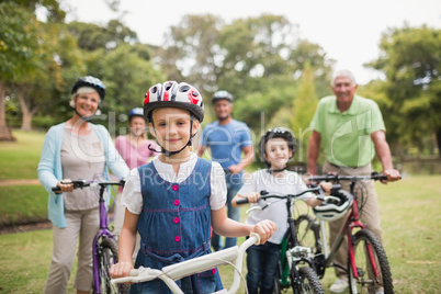 Happy family on their bike at the park