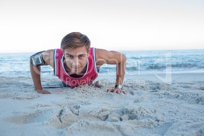 Handsome man doing push ups Handsome man doing push ups