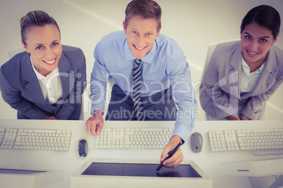 Businessman showing his screen to the team